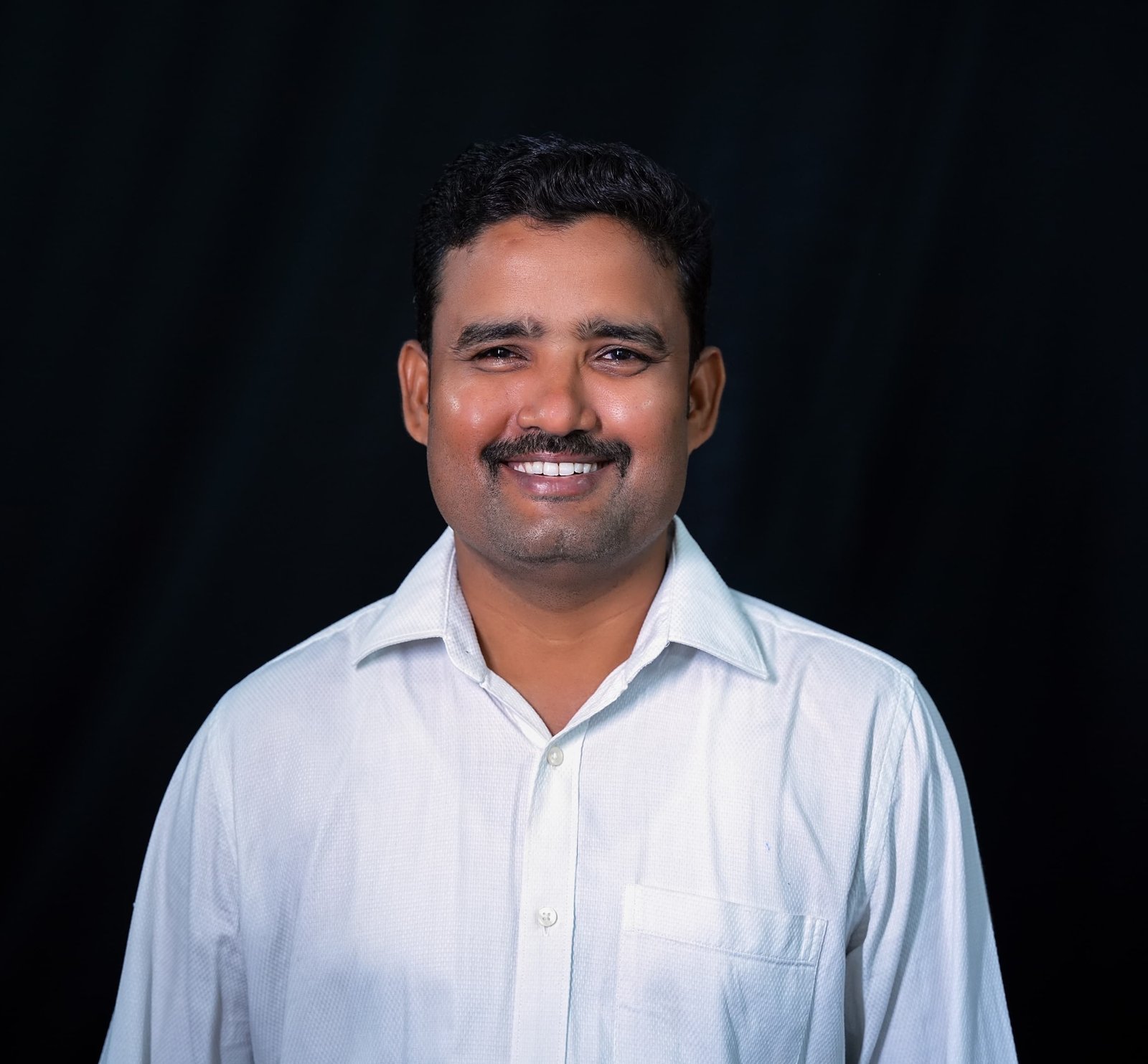 Malluri Pola Raju professional portrait - Healthcare and Insurance specialist